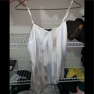 Asymmetrical hemline top